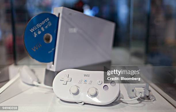 Nintendo Wii game console sits on display inside the Nintendo World store in New York, U.S., on Tuesday, Jan. 27, 2009. Nintendo Co., maker of the...