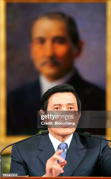 Ma Ying-jeou, Taiwan's president, speaks in front of a portrait of Chiang Kai-shek, the late former president and head of KMT, during a news...