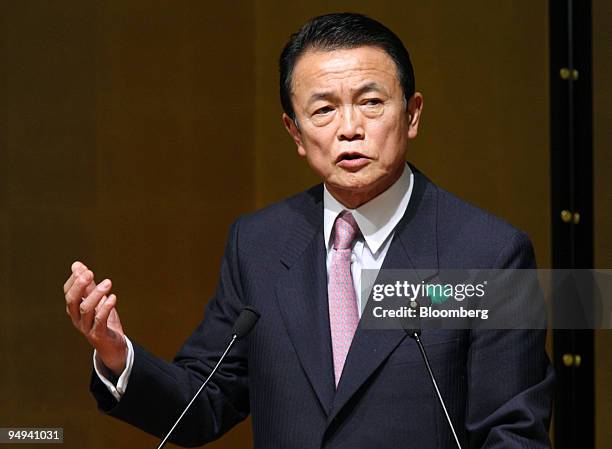 Taro Aso, Japan's prime minister, speaks during the opening reception for newly constructed Keidanren Kaikan, the Japan Business Federation...