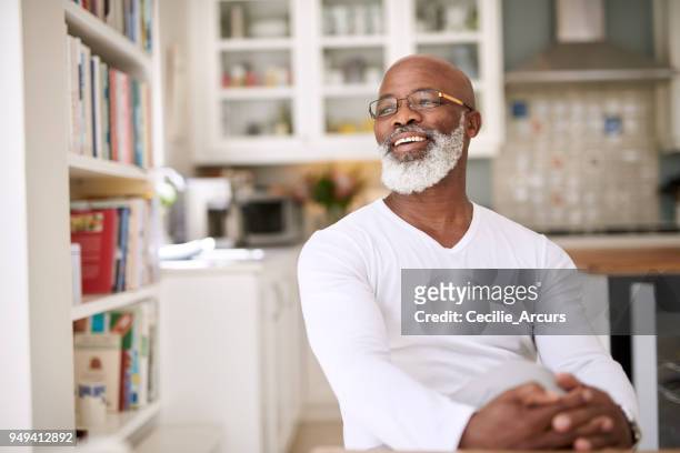 being at home just makes me happy - african american man day dreaming stock pictures, royalty-free photos & images