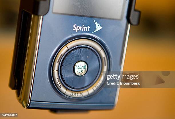 Samsung Highnote mobile phone sits on display at a Sprint Nextel Corp. Retail store in New York, U.S., on Thursday, Feb. 19, 2009. Sprint, the...