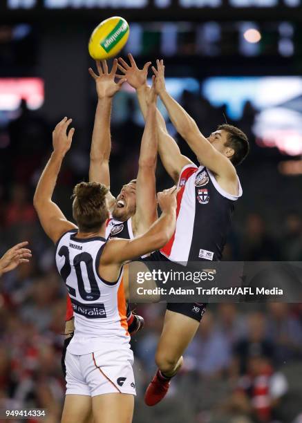 Jade Gresham of the Saints attempts to mark over Jack Steven of the Saints during the 2018 AFL round five match between the St Kilda Saints and the...