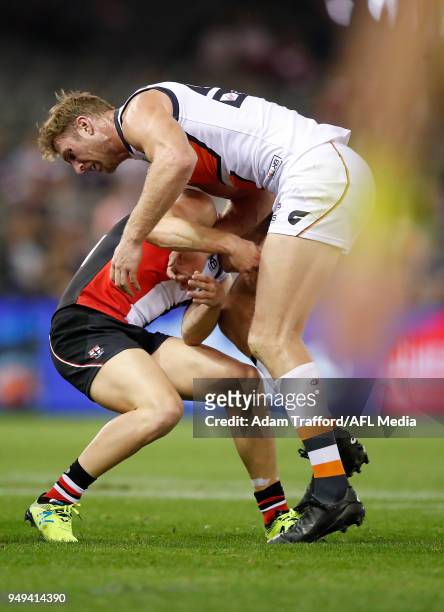 Jack Newnes of the Saints clashes with Dawson Simpson of the Giants during the 2018 AFL round five match between the St Kilda Saints and the GWS...