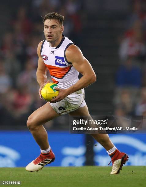 Stephen Coniglio of the Giants in action in his 100th game during the 2018 AFL round five match between the St Kilda Saints and the GWS Giants at...