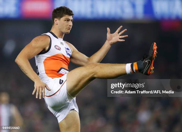 Jonathon Patton of the Giants kicks the ball during the 2018 AFL round five match between the St Kilda Saints and the GWS Giants at Etihad Stadium on...