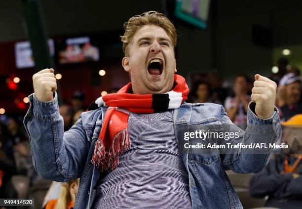 Saints fan celebrates a goal during the 2018 AFL round five match between the St Kilda Saints and the GWS Giants at Etihad Stadium on April 21, 2018...