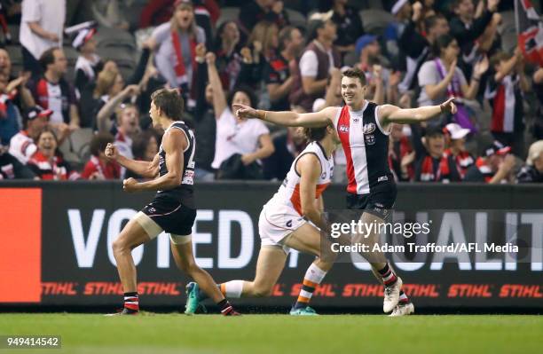 Blake Acres of the Saints runs into to congratulate Ben Long of the Saints on a brilliant last quarter goal during the 2018 AFL round five match...