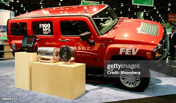 The 100+ MPG plug in hybrid Hummer H3 sits on display at SAE World Congress at Cobo Hall in Detroit, Michigan on Monday, April 20, 2009. Raser...