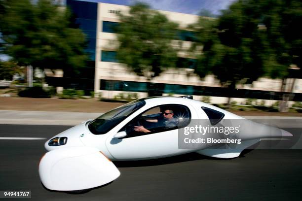 The Aptera 2e electric three-wheeled car is driven near the company's headquarters in Vista, California, U.S., on Friday, Feb. 20, 2009. Aptera...