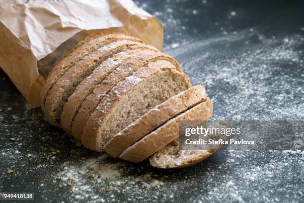 fresh sliced whole grain loaf of bread - sliced bread bildbanksfoton och bilder