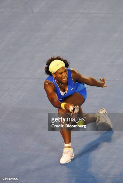 Serena Williams of the United States returns the ball to Elena Dementieva of Russia during their match on day 11 of the Australian Open Tennis...