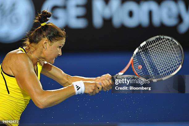 Dinara Safina of Russia returns the ball to Vera Zvonareva of Russia during their match on day 11 of the Australian Open Tennis Championship, in...