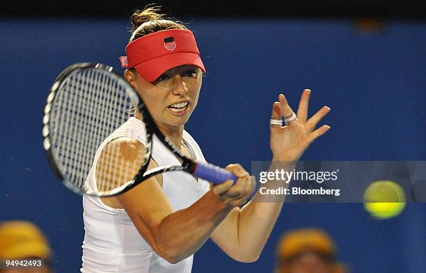 Vera Zvonareva of Russia returns the ball to Dinara Safina of Russia during their match on day 11 of the Australian Open Tennis Championship, in...