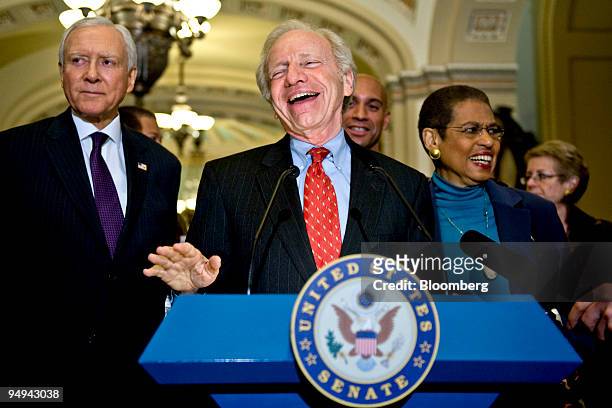 Senator Joe Lieberman, an independent from Connecticut, center, speaks during a press conference after the Senate passed the District of Columbia...