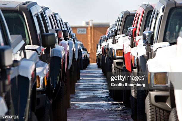 General Motors Co. Hummer H3 vehicles sit parked in a storage lot at the Port of Newark in Newark, New Jersey, U.S., on Thursday, Jan. 29, 2009.