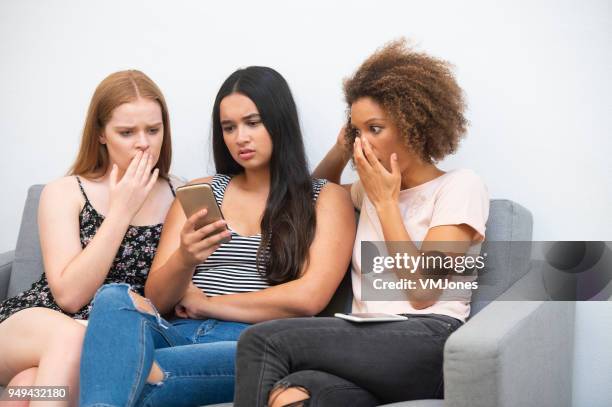 girls responding to negative social media - shopping disappointment stock pictures, royalty-free photos & images