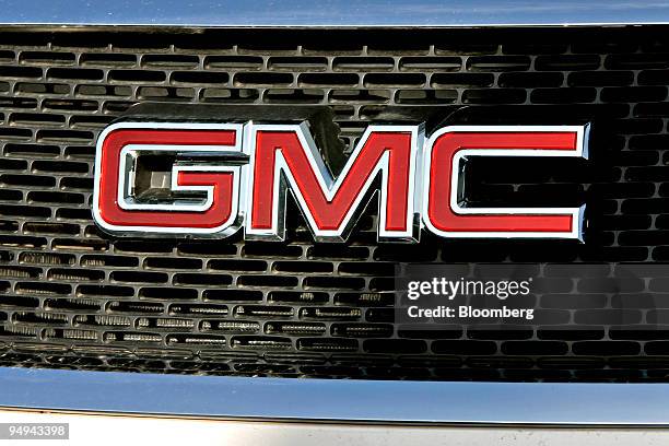 General Motors GMC logo is displayed on a sport utility vehicle on the Fred Beans dealership lot in Doylestown, Pennsylvania, U.S., on Saturday, Feb....