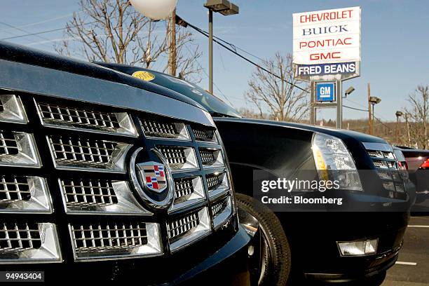 New General Motors Cadillac Escalade sport utility vehicles sit on the Fred Beans dealership lot in Doylestown, Pennsylvania, U.S., on Saturday, Feb....