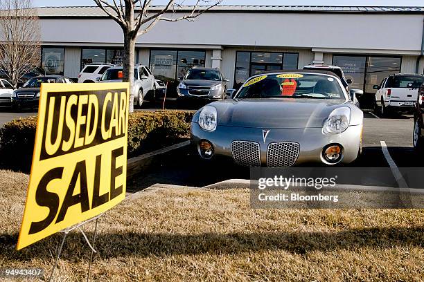 Previously owned General Motors Pontiac Solstice convertible sits on the Fred Beans dealership lot in Doylestown, Pennsylvania, U.S., on Saturday,...
