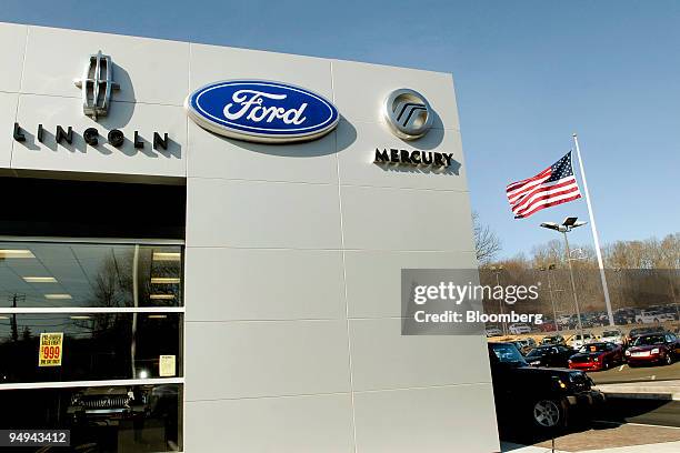 Ford, Lincoln and Mercury signage is displayed next to the Fred Beans dealership lot in Doylestown, Pennsylvania, U.S., on Saturday, Feb. 28, 2009....