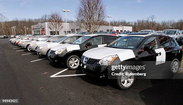 New Nissan vehicles sit on the Fred Beans dealership lot in Doylestown, Pennsylvania, U.S., on Saturday, Feb. 28, 2009. February sales may fall 34...