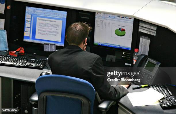 Man works on the floor of the Mexican Stock Exchange, or Bolsa Mexicana de Valores , in Mexico City, Mexico, on Wednesday, May 20, 2009. Mexican...