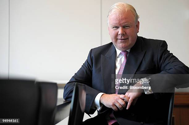 Mike Smith, chief executive officer of Australia & New Zealand Banking Group Ltd. , poses for a photograph during an interview at the bank's...
