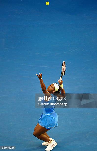 Serena Williams of the U.S. Serves the ball to Dinara Safina of Russia during the women's final match on day 13 of the Australian Open Tennis...