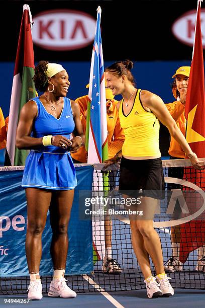 Serena Williams of the U.S., left, speaks with Dinara Safina of Russia following their women's final match on day 13 of the Australian Open Tennis...