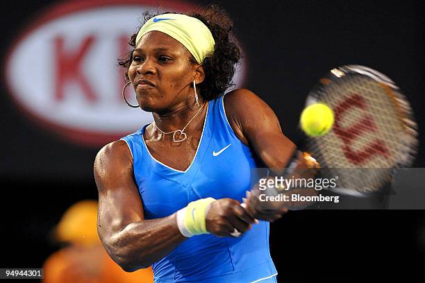 Serena Williams of the U.S. Returns the ball to Dinara Safina of Russia during the women's final match on day 13 of the Australian Open Tennis...