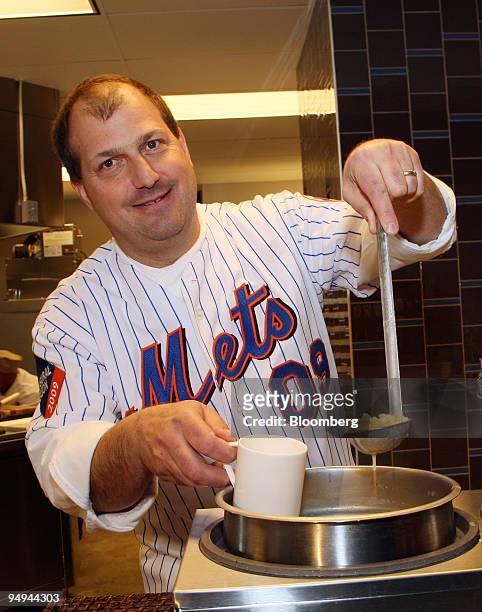Dave Pasternack, owner of Esca restaurant, ladles Long Island clam corn chowder during a culinary media day at Citi Field in Flushing, New York,...