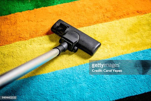 pov vacuum cleaner on carpet - saugen stock-fotos und bilder