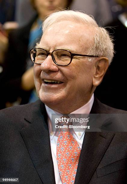 Warren Buffett, chairman of Berkshire Hathaway Inc., speaks while on the exhibition floor during Berkshire?s annual shareholder meeting at the Qwest...