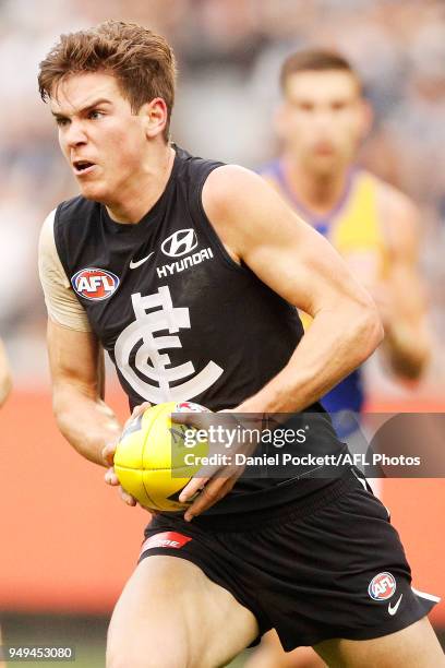 Paddy Dow of the Blues runs with the ball during the round five AFL match between the Carlton Blues and the West Coast Eagles at Melbourne Cricket...