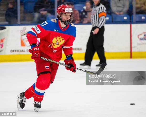 Semyon Kizimov of the Russian Nationals skates up ice with the puck against the USA Nationals during the 2018 Under-18 Five Nations Tournament game...