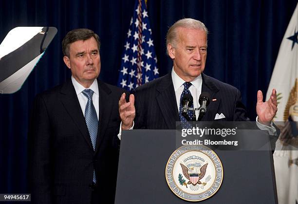 Gil Kerlikowske, chief of the Seattle police department, left, listens to U.S. Vice President Joseph Biden speak in the Eisenhower Executive Office...