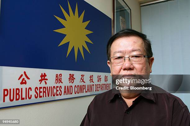 Michael Chong, head of the Public Services and Complaints Department of the Malaysian Chinese Association, poses for a photograph at his office in...