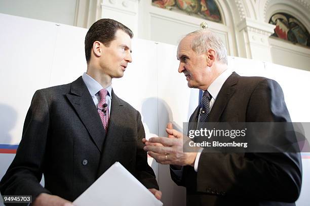 Prince Alois of Liechtenstein, left, speaks with Otmar Hasler, Liechtenstein's prime minister, at a news conference in Vaduz, Liechtenstein, on...