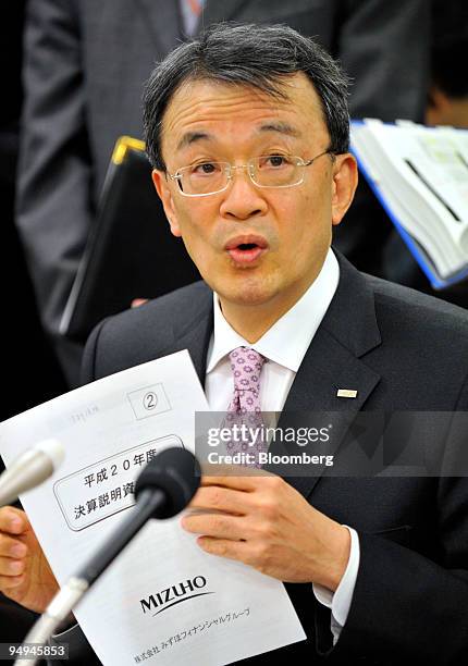 Takashi Tsukamoto, president and chief executive officer of Mizuho Financial Group Inc., speaks during a news conference in Tokyo, Japan, on Friday,...