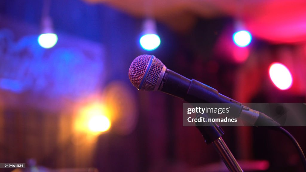 Single microphone on the stage in nightclub