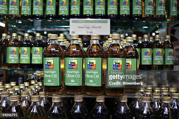 Everyday Value extra virgin olive oil, a Whole Foods Market Inc. Private label brand, sits on display inside a Whole Foods Market in New York, U.S.,...