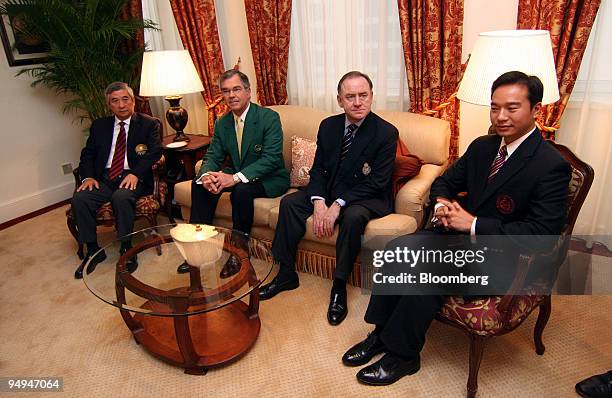 Tommy Lee, chairman of the Asia Pacific Golf Confederation, left, Billy Payne, chairman of the Masters Golf Tournament, second left, Peter Dawson,...