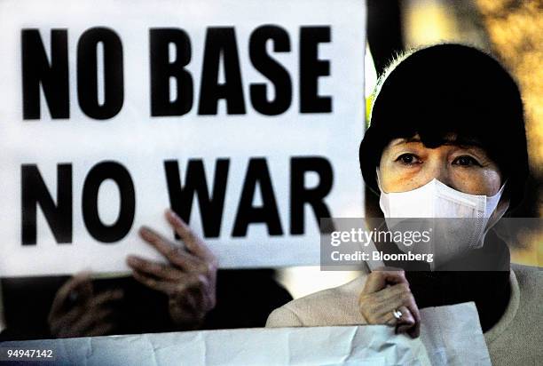 Protesters take part in a demonstration outside the U.S. Embassy in Tokyo, Japan, on Monday, Feb. 16, 2009. Hillary Clinton said she will use her...