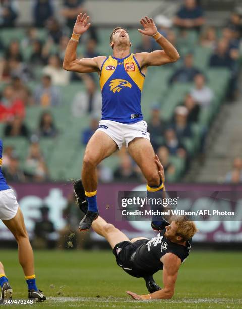 Scott Lycett of the Eagles and Andrew Phillips of the Blues compete for the ball during the 2018 AFL round five match between the Carlton Blues and...