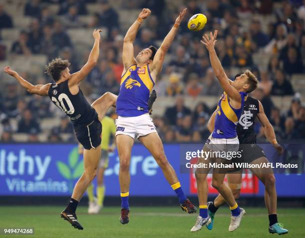 Charlie Curnow of the Blues, Tom Barrass of the Eagles and Brad Sheppard of the Eagles compete for the ball during the 2018 AFL round five match...