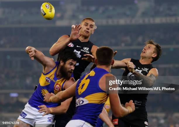 Liam Jones of the Blues and Josh Kennedy of the Eagles compete for the ballduring the 2018 AFL round five match between the Carlton Blues and the...