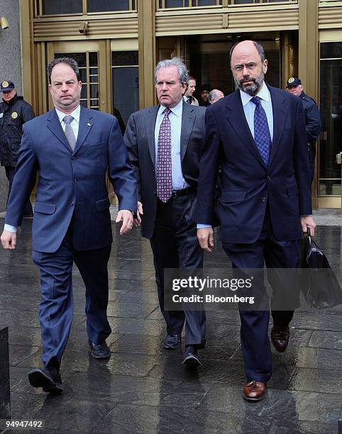 Marc Dreier, founder of Dreier LLP, leaves federal court after a hearing with his attorney Gerald Shargel, right, in New York, U.S., on Thursday,...