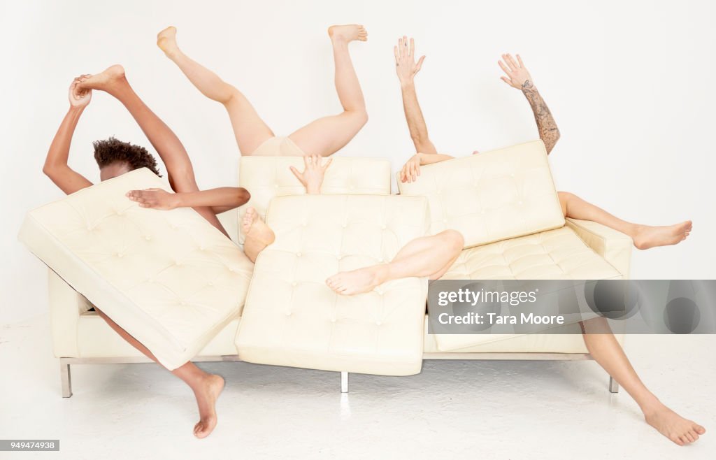 Legs sticking out of sofa