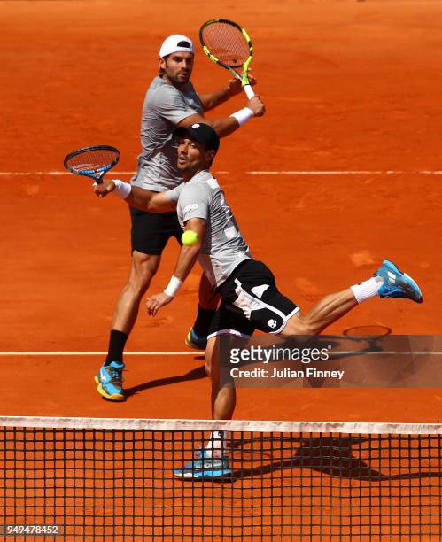 Simone Bolelli and Fabio Fognini of Italy in action against Bob and Mike Bryan of USA in the doubles semi final during day seven of the ATP Masters...