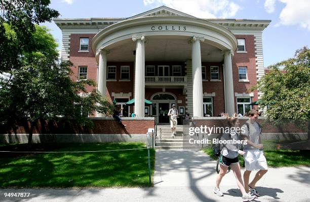 Students walk outside the Collis building on the campus of Dartmouth College, the smallest school in the Ivy League, in Hanover, New Hampshire, U.S.,...